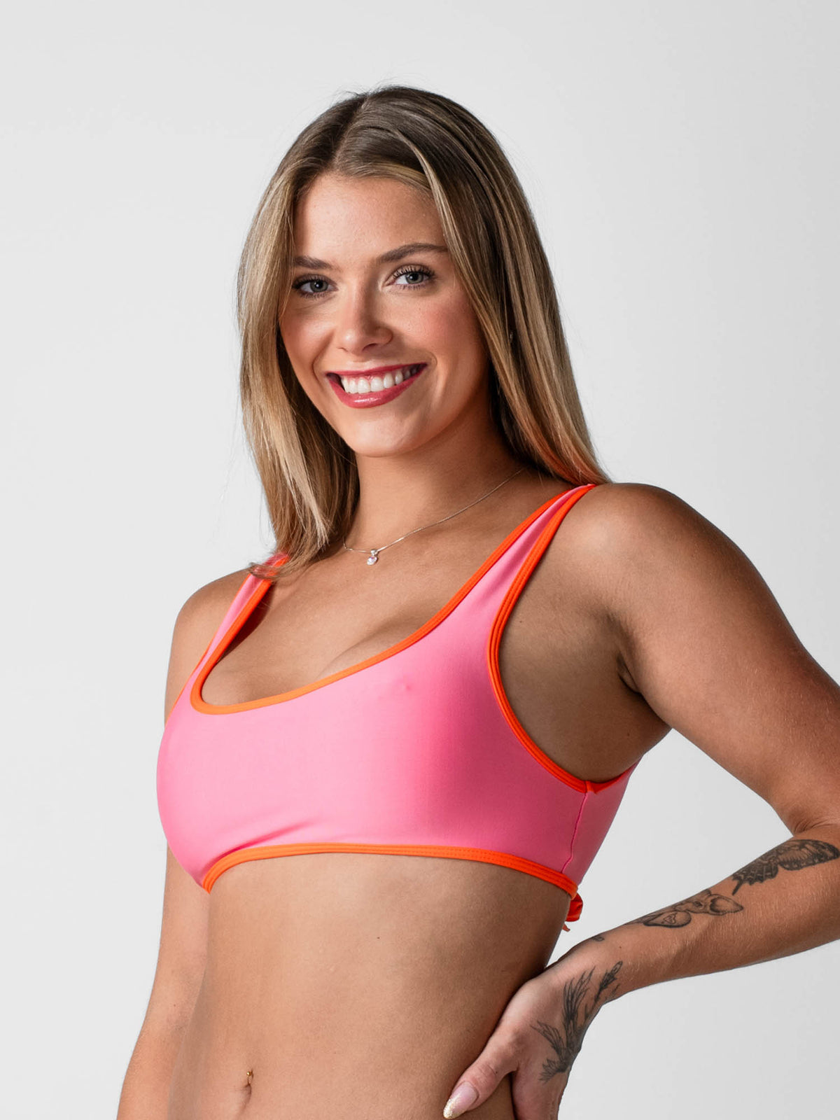 Top de Bikini Daikiri Mujer Deportivo Ajustable Rosa con Naranja Protección UV50+ Tercera