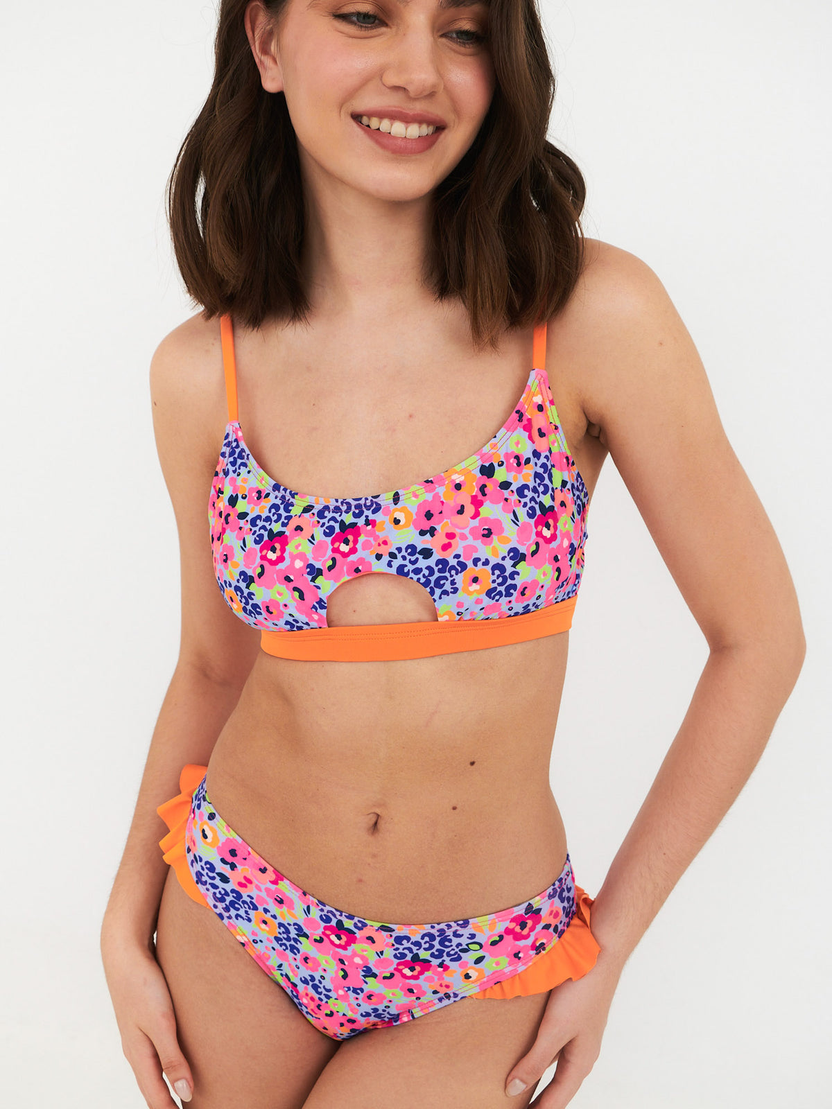 Top de Bikini Daikiri Mujer Deportivo Soporte Flores Celeste Flúor Protección UV50+ Principal